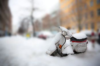 Scooter buried in snow